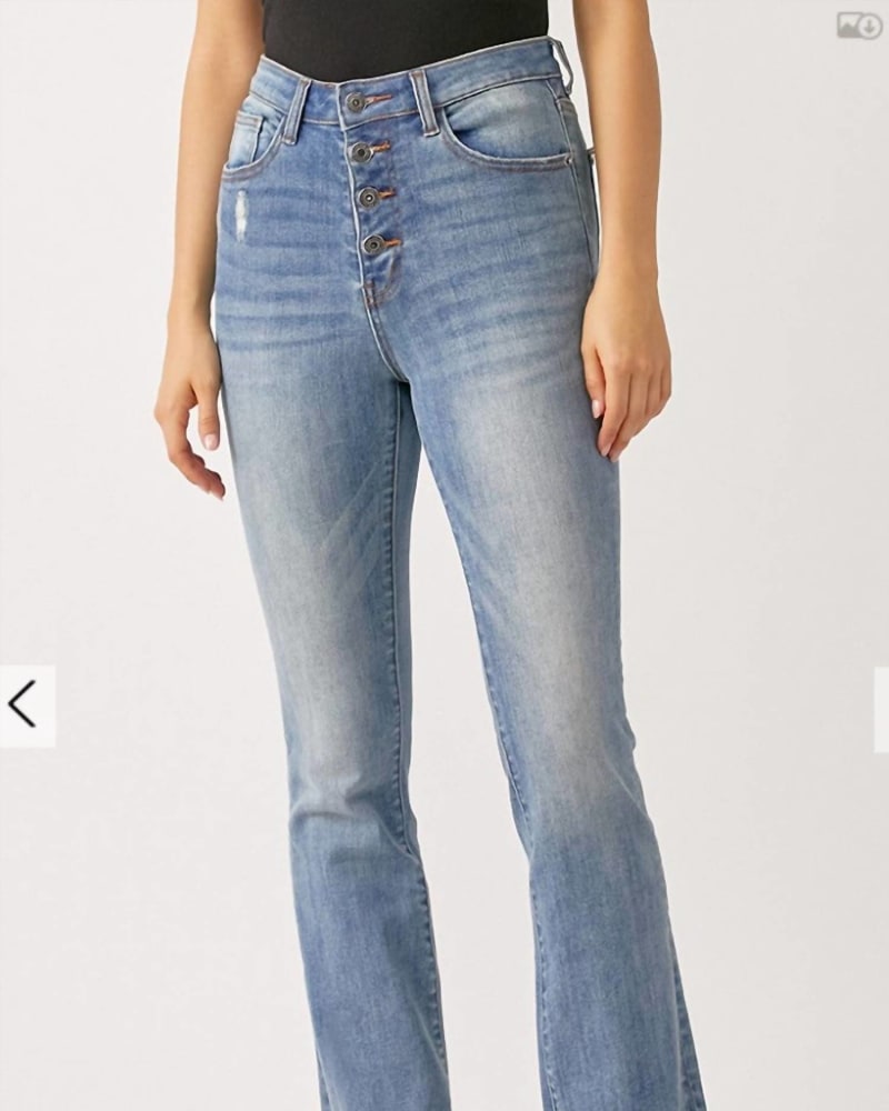 Front of a model wearing a size 1X Button Fly Raw Hem in Blue Denim in Blue Denim by RISEN. | dia_product_style_image_id:325892